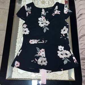 Dynamite black floral short-sleeved peplum blouse with tie back